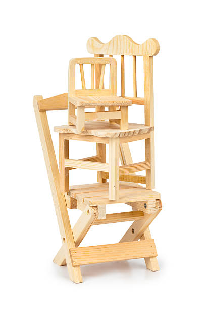 istock Stacked toy wooden chairs 613772252