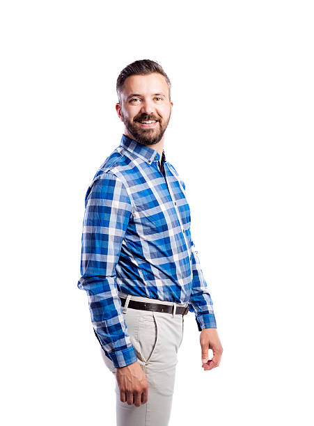 istock Hipster man in checked blue shirt, studio shot, isolated. 613772932