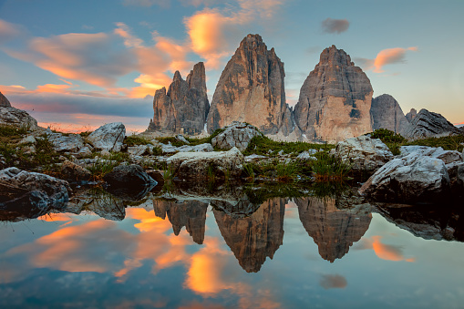 Tre Cime di Lavaredo at beautiful sunrise with reflection in small lake,  Dolomites, Alps, Italy, Europe (Drei Zinnen)