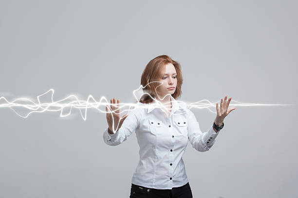 istock Woman making magic effect - flash lightning. The concept of 613775134