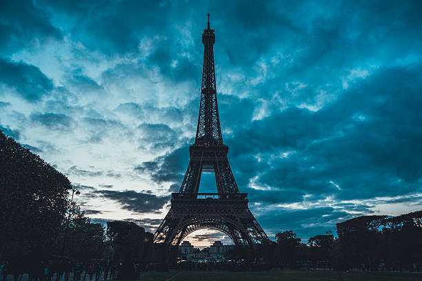istock Silhouette of the Eiffel Tower, Paris at sunset 613777974