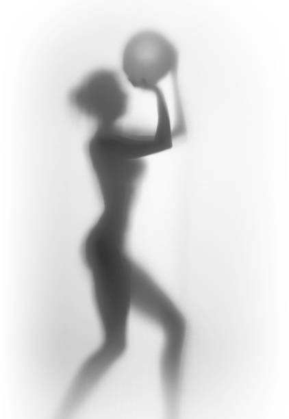 Slim female body silhouette with basket ball
