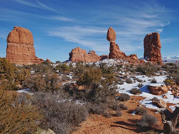 istock Balanced Rock Formation, Snow, Arches National Park, Moab, Utah 613780102