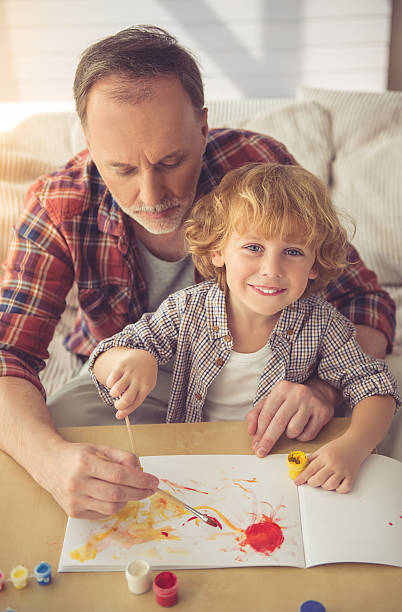 istock Grandpa and grandson 613780814