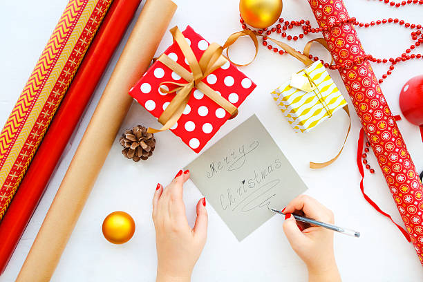 istock Christmas background with decorations and gift boxes on white 613781428