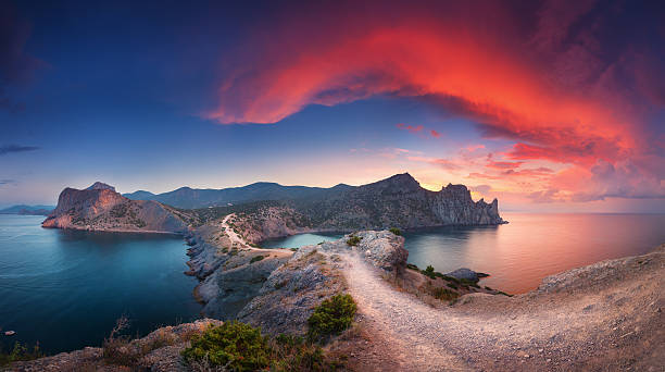istock Panoramic landscape with mountains, sea and beautiful sky in sum 613782382