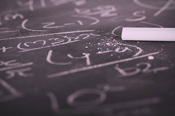 istock Close up of blackboard with maths equations Vintage Retro Filter 613784126