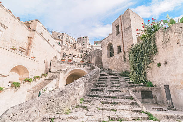 istock typical old stairs view of Matera under blue sky 613784284