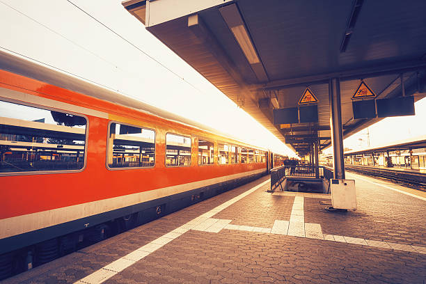 istock High speed passenger train on railroad track in motion 613784468