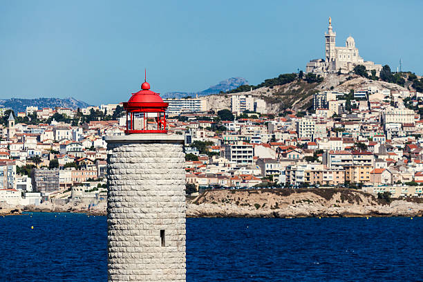Lighthouse on If island in Marseille Lighthouse on If island and Marseille panorama. Marseille, Provence-Alpes-Cote d'Azur, France. frioul archipelago stock pictures, royalty-free photos & images