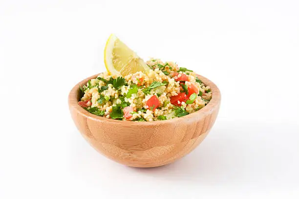 Tabbouleh salad with couscous isolated on white background