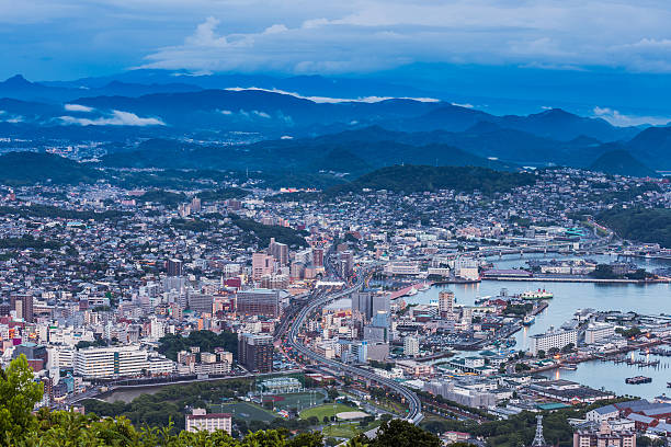 istock Sasebo downtown skyline at night, Nagasaki, Japan. 613792150
