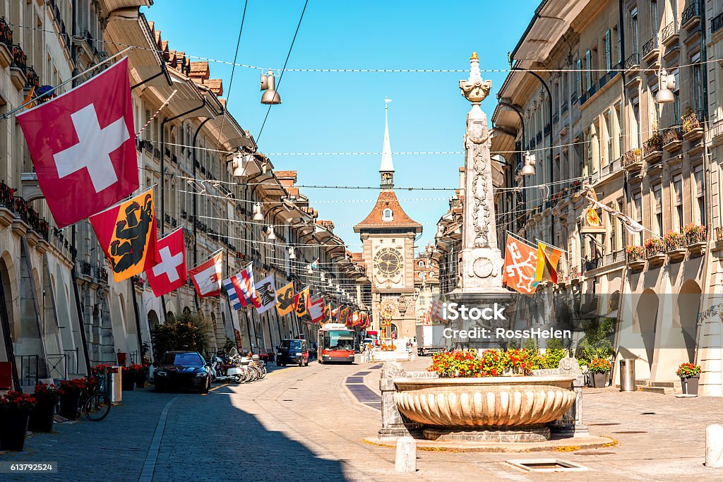 Street view in Bern city Street view on Kramgasse with fountain and clock tower in the old town of Bern city. It is a popular shopping street and medieval city centre of Bern, Switzerland Bern Stock Photo