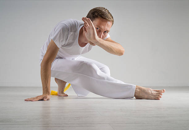 istock Man practicing capoeira , brazilian martial art. 613794344