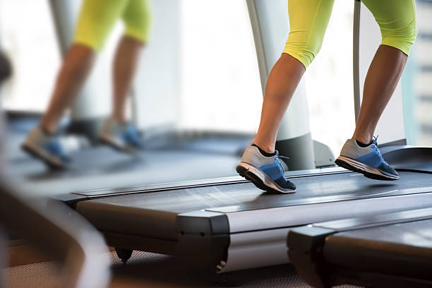 istock Women running on treadmill 613794756