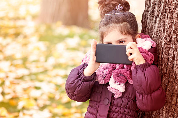 istock Girl Taking a Selfie with Smartphone 613860530