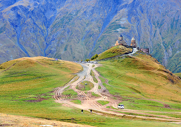 istock Scenic view of Trinity chapel in mountains 613862084
