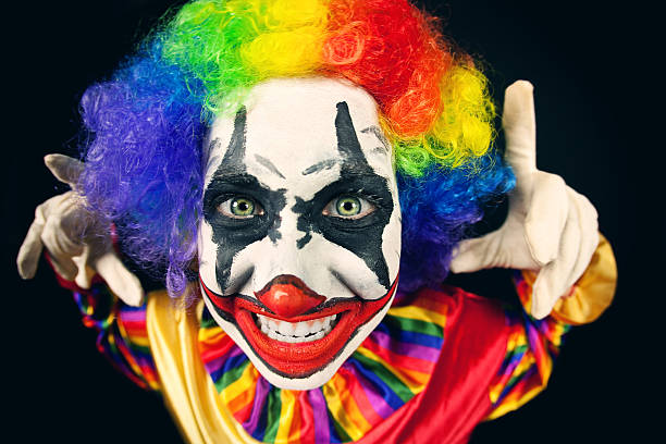 istock Creepy Clown Funhouse Face 613863724