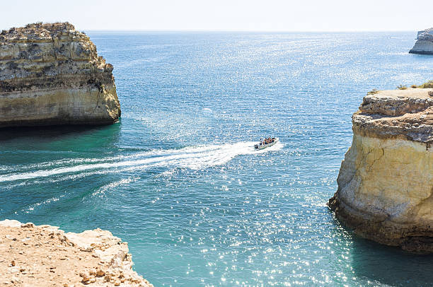 istock motor boat at sea off coast 613864448