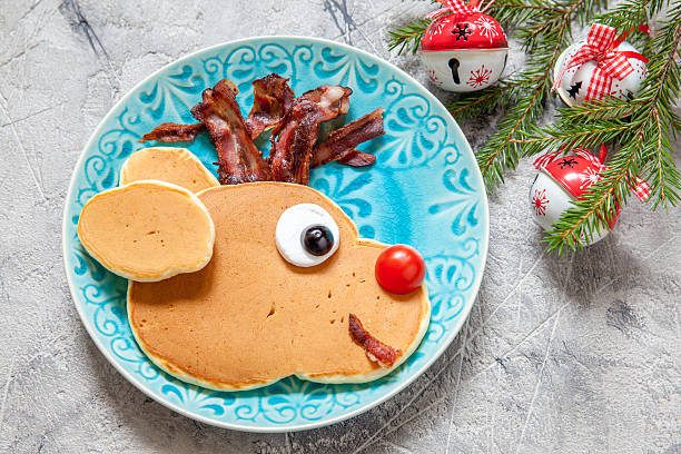 istock Christmas food for kid. Reindeer pancake 613864504