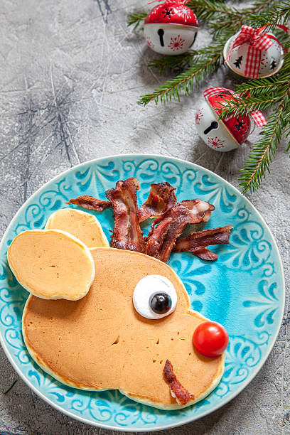 istock Christmas food for kid. Reindeer pancake 613864642