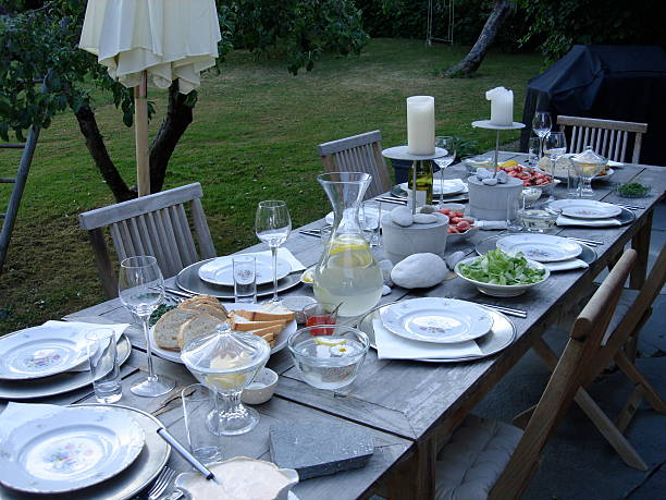 istock Table made for dinner in the garden 613866330