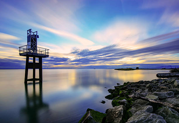 istock rocky sea beach at sunset, with dramatic sky 613866968