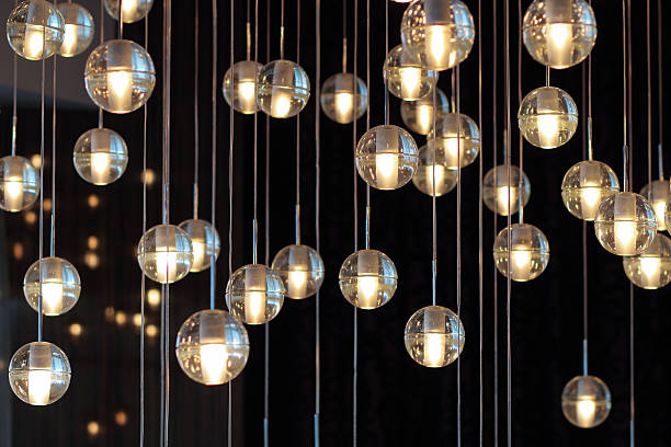 istock lamps on the dark background, selective focus, horizontal 613867824