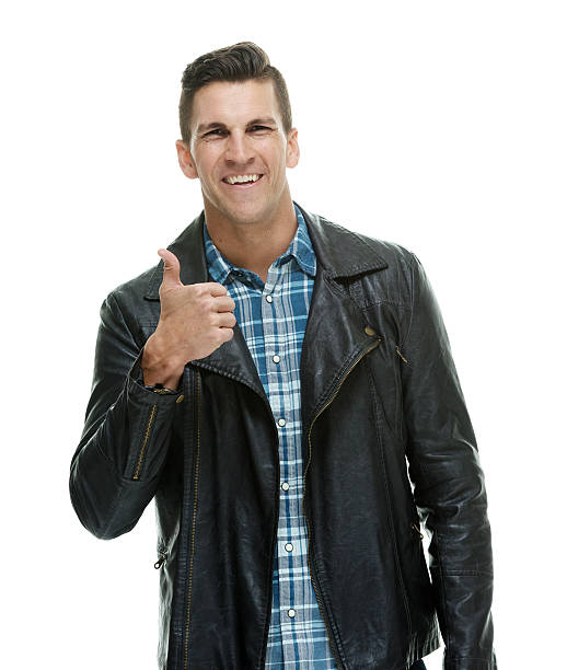 istock Smiling man giving thumbs up 613868724