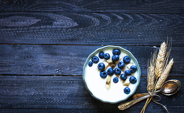 istock Healthy Breakfast with blueberries and banana yogurt 613875430