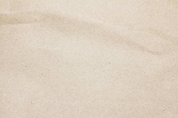 istock Recycled crumpled brown paper texture or paper background for design. 613875976