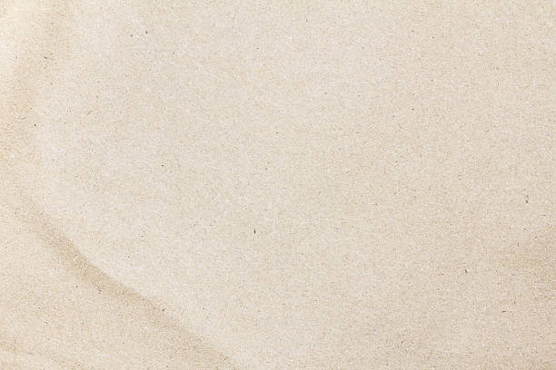 istock Recycled crumpled brown paper texture or paper background for design. 613876190