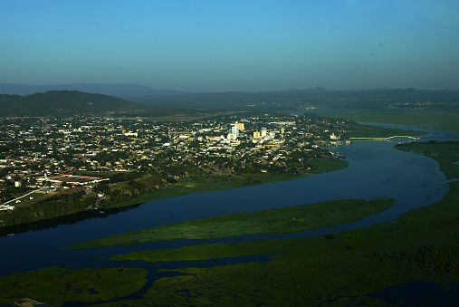 Aerial view of waterfront homes and hi-rise buildings at Broadbeach, Gold Coast, Australia