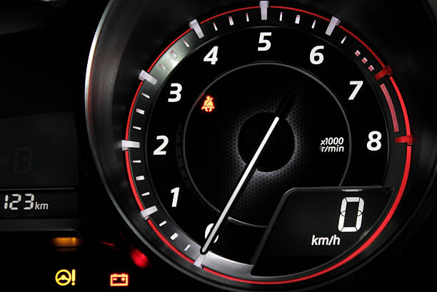 istock Glowing arrow shows zero engine revolution on car tachometer 613877562