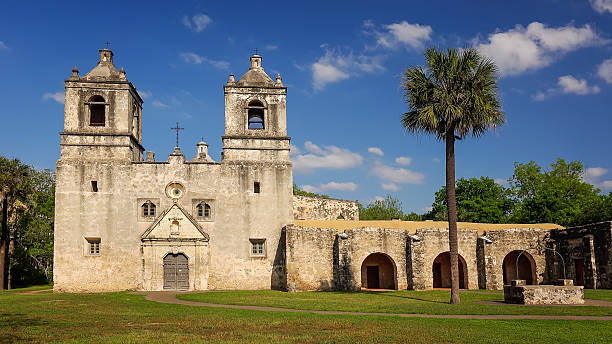 Clouds roll past the old Spanish Mission Concepcion in San Antonio, Texas