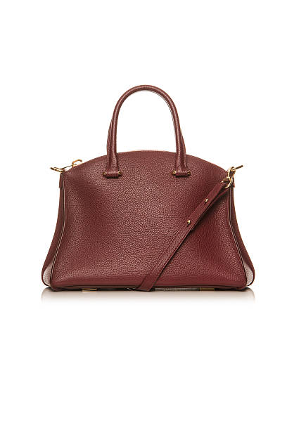 istock Women's handbag on a white background 613879262