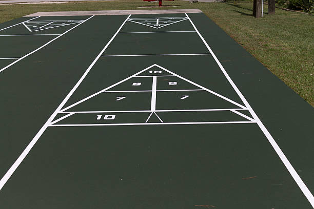 A freshly refinished shuffleboard park at a local park.