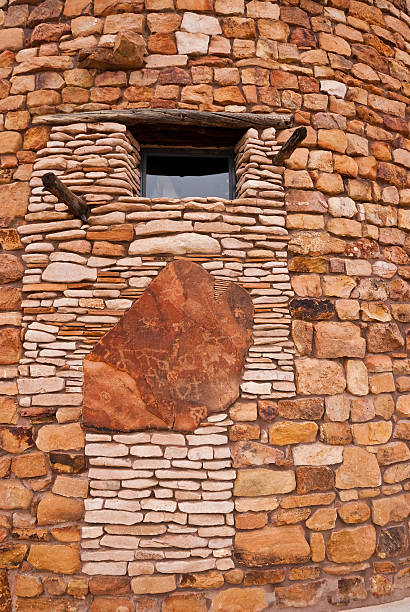 The Desert View Watchtower is a 70-foot high stone building located on the South Rim within Grand Canyon National Park in Arizona, USA. The four-story historic structure, completed in 1932, was designed by American architect Mary Colter who also created and designed many other buildings in the Grand Canyon vicinity including Hermit's Rest and the Lookout Studio.