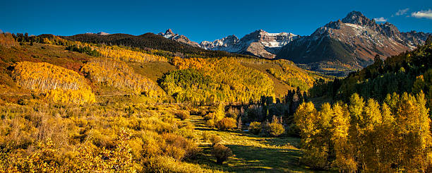 istock Golden Autumn Mountain Panorama 613885528