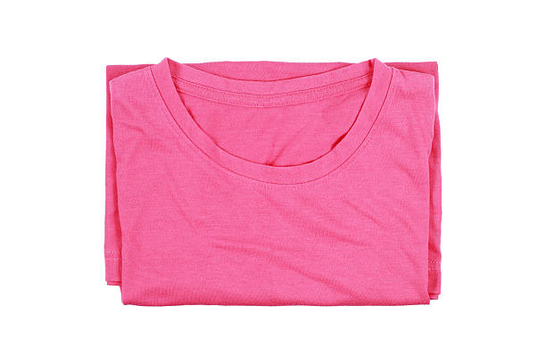 istock folding cotton pink T-shirt isolated on white 613886068