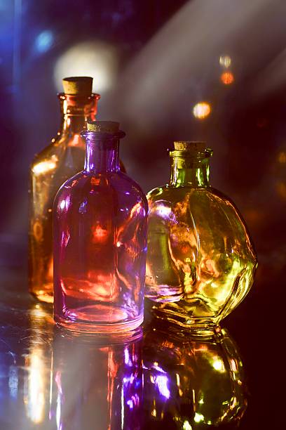 istock Magic love witch brew potion colorful glasses bottles 613886182