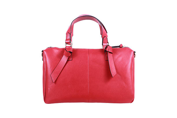 istock red leather handbag isolated on white 613886186