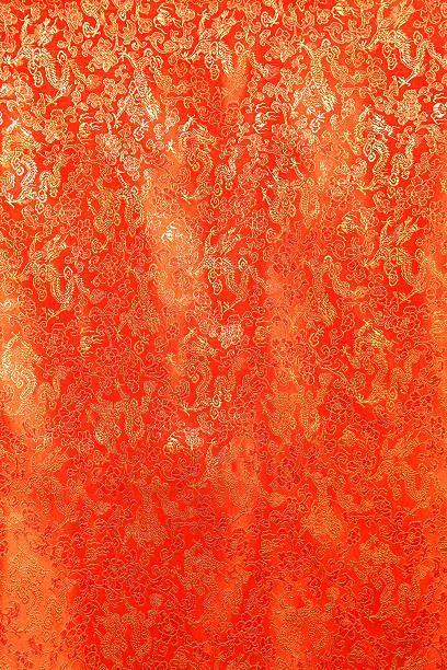 istock Chinese's style red cloth, dragon and treetop pattern 613886612