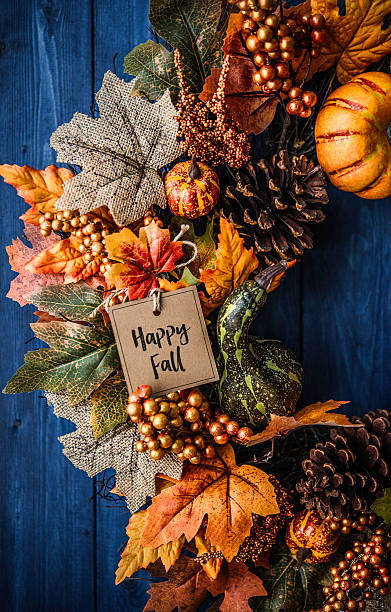 istock Ornate fall wreath with pumpkins, pinecones, message and leaves 613887336