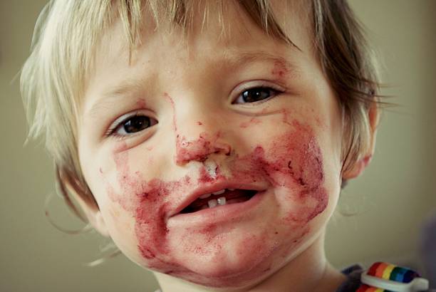 istock Toddler covered in Food 613887980
