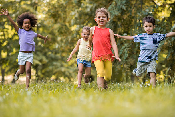 istock Playful children running in nature and having fun. 613890188