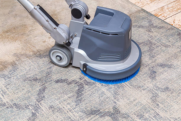 istock Carpets chemical cleaning with professionally disk machine. Early spring cleaning. 613890444