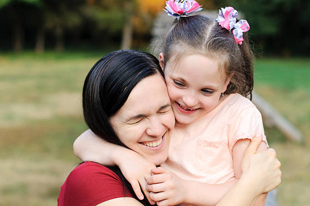 istock Mother hugs her daughter 613892016