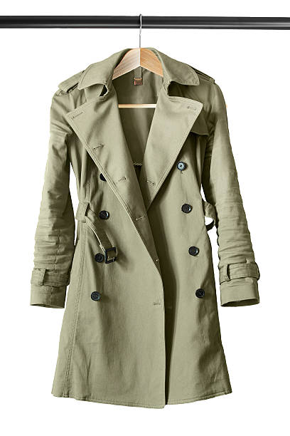 istock Trench coat on clothes rack 613892794