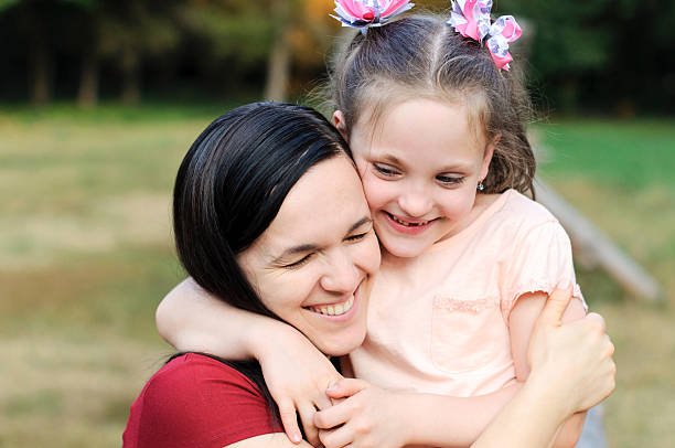 istock Mother hugs her daughter 613894896